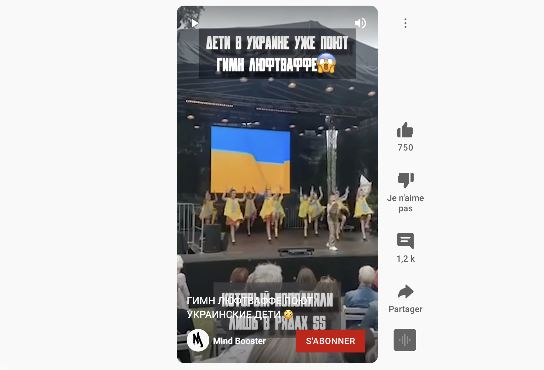 Un adolescent ukrainien, accompagné de danseuses toutes aussi jeunes que lui, chante la version hollandaise  de Son ar chistr: une adaptation de la version populaire d'Alan Stivell par le groupe BOTS, les deux derniers couplets en ukrainien qui parlent de se battre tous ensemble pour la liberté ont été supprimés lors du montage. Le texte russe en blanc dit : "Les enfants en Ukraine chantent déjà l'hymne de la Luftwaffe qui n'était chanté que dans les rangs des SS". Diffusé sur Youtube https://youtube.com/shorts/ysETOLmqpYk?feature=share.